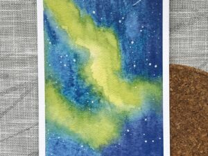 A print of Nikki's "Aurora Borealis 1" painting, printed on textured paper.