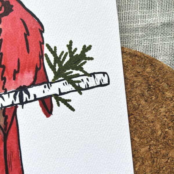 A close up of a print of Nikki's "Halfsider" painting, printed on textured paper.